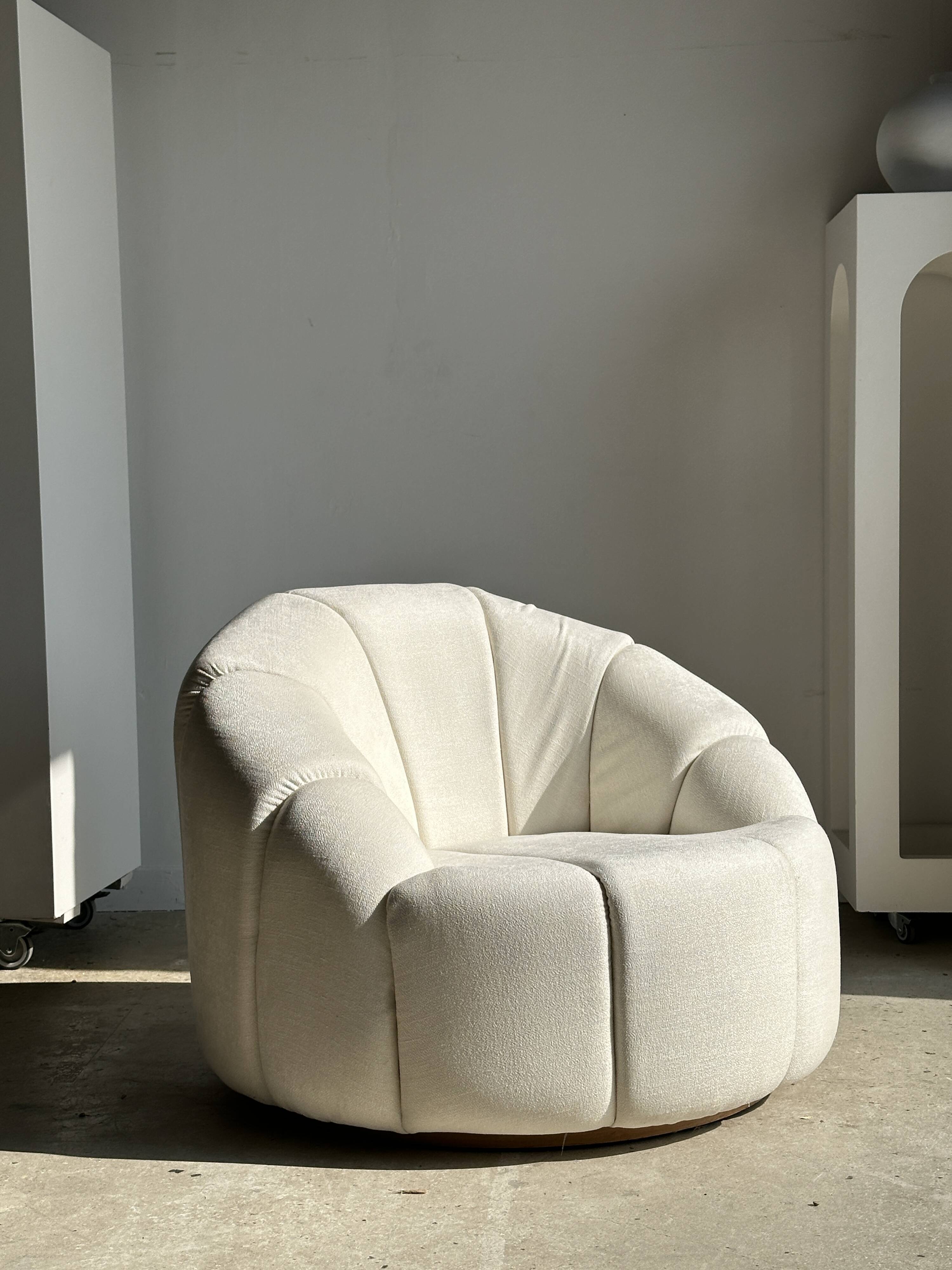 Large white circular armchair, white fabric upholstery