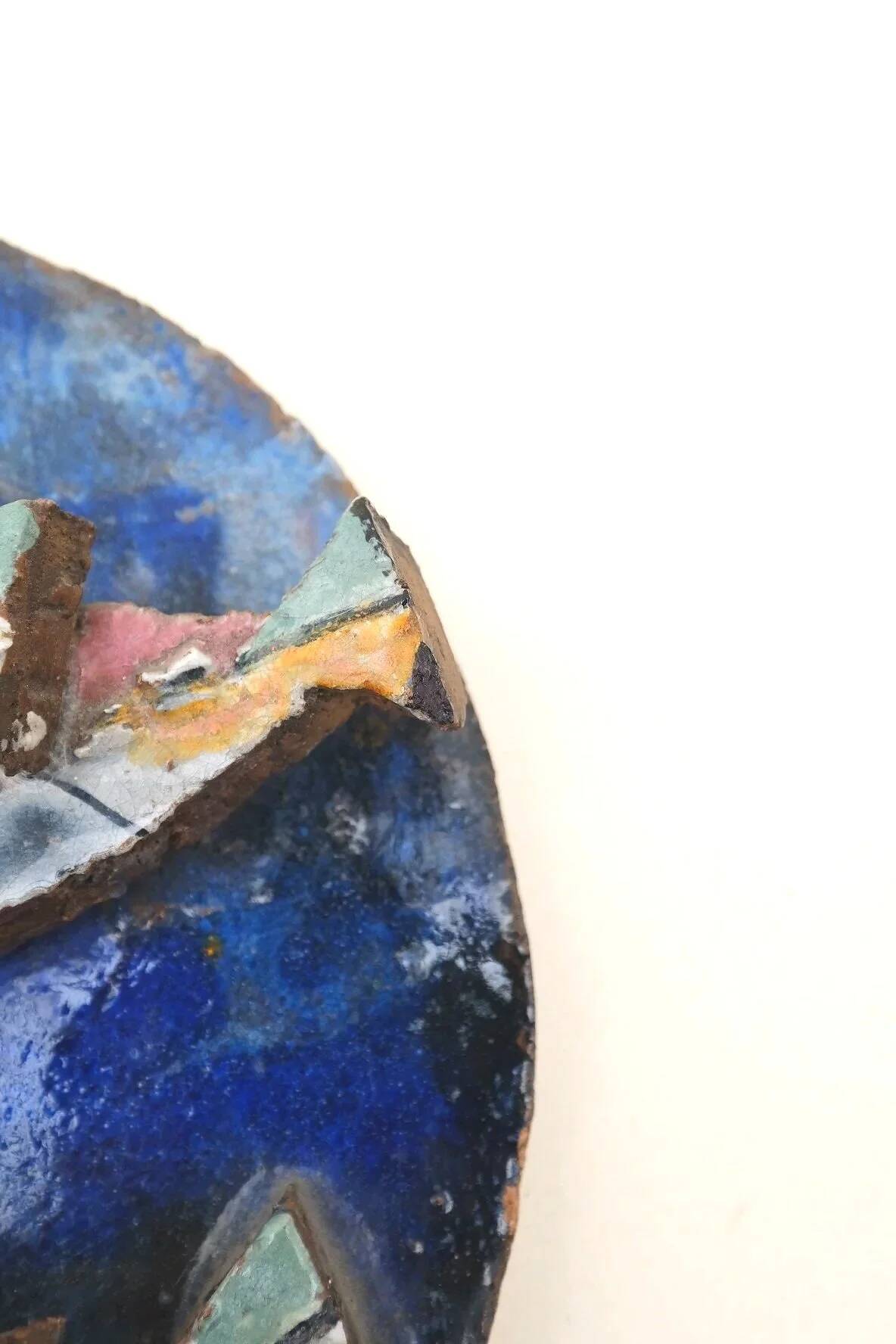 Ceramic wall plaque depicting fish