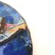 Ceramic wall plaque depicting fish