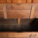 Antique English oak hall bench from the early 19th century with storage space