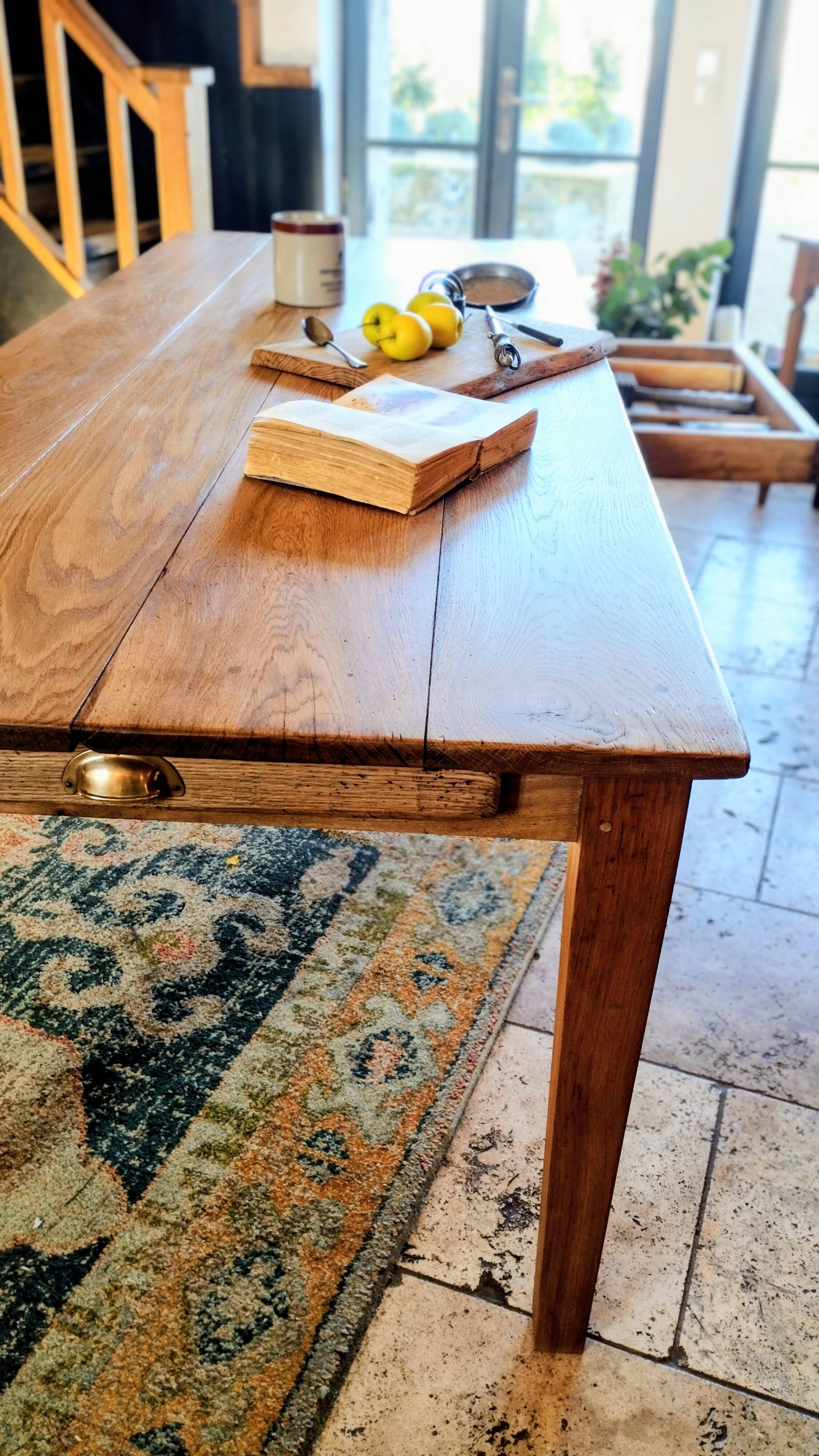 Solid oak farmhouse table with central drawer and extension