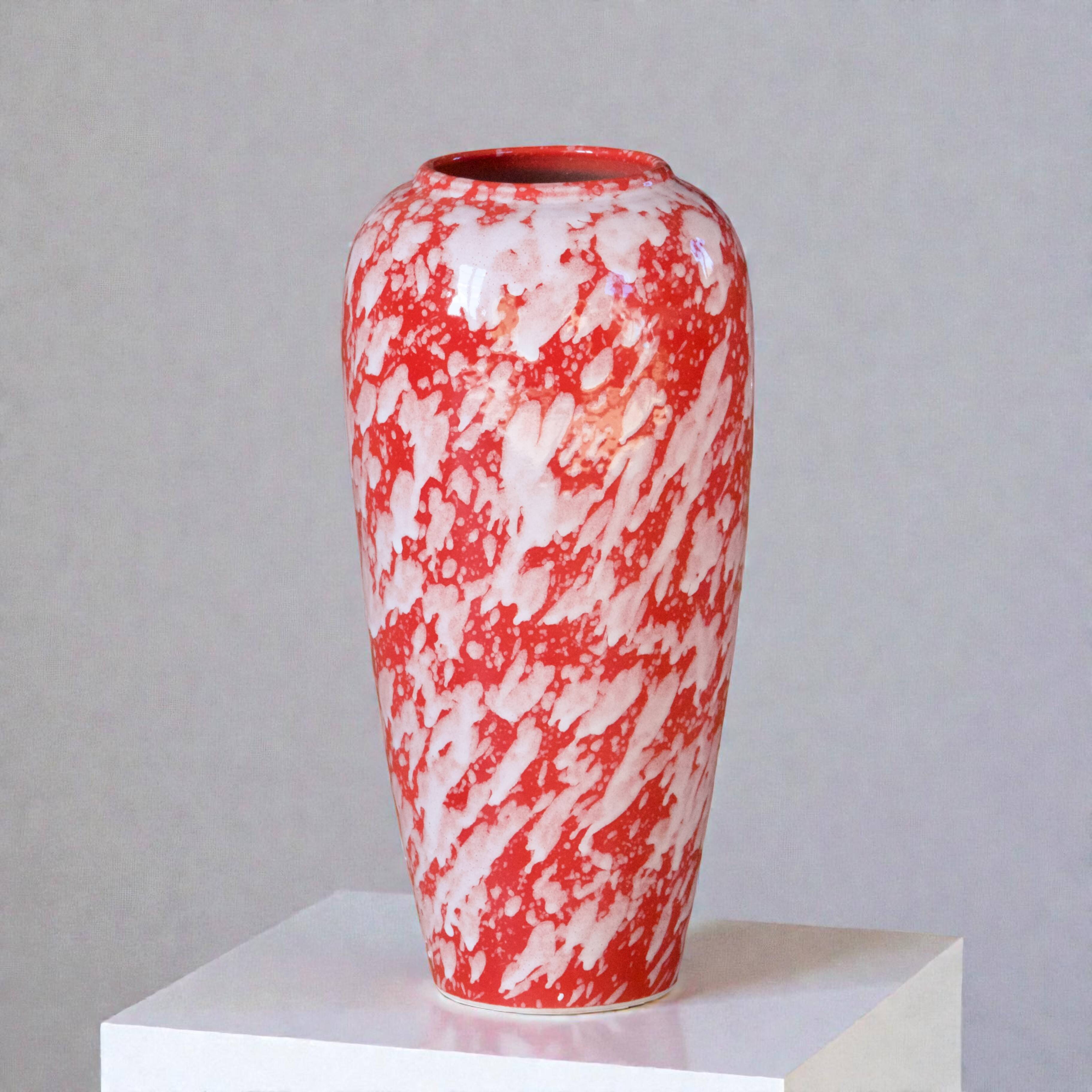 Large handcrafted vase in red speckled glazed ceramic.