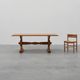 20th Century French oak trestle table with scalloped legs and plank top