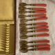 Set of 12 coral and gold dessert forks