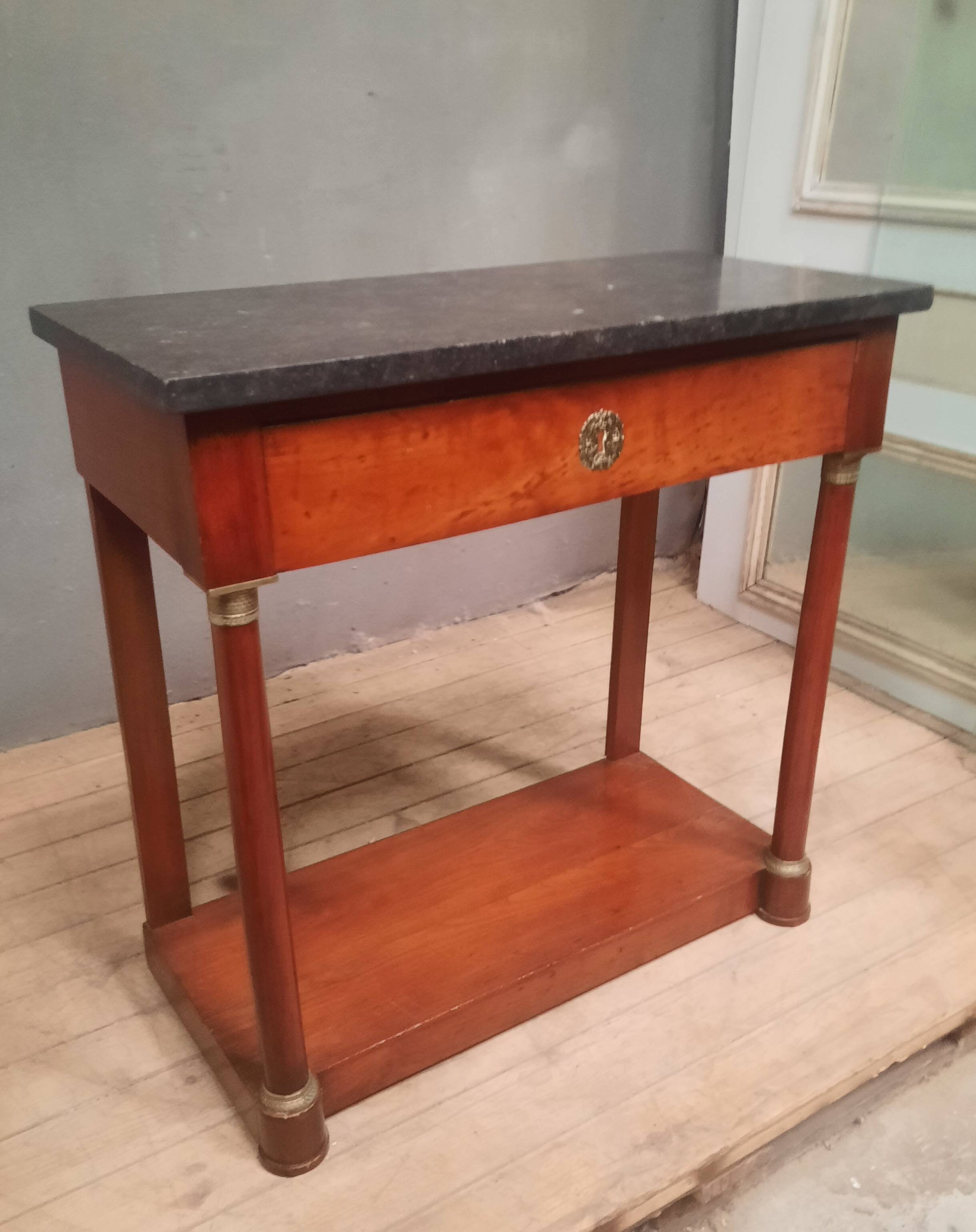 Empire period marble top console table