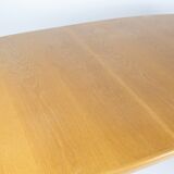 Dining table in oak of danish design manufactured by Skovby Furniture Factory from the 1960s.