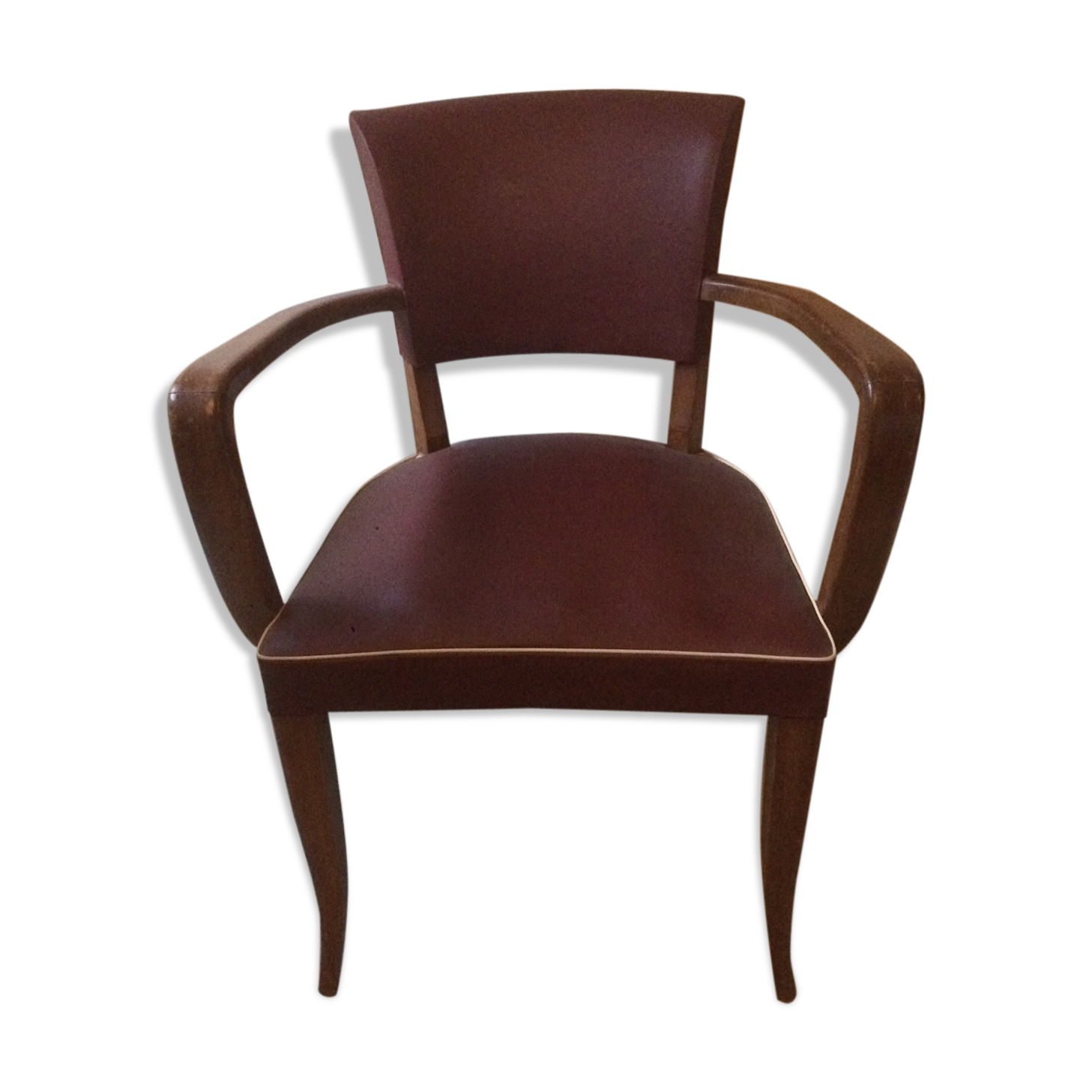 Skai chair binds wine and wooden footpieces and armrests