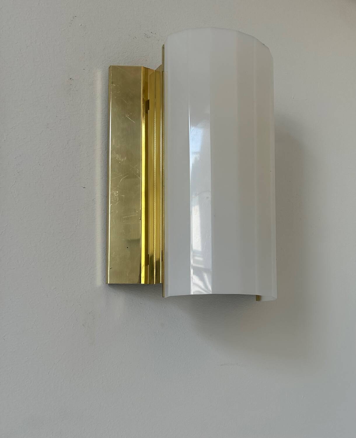 Pair of brass and perspex wall lights, Fagerhult Sweden 1970
