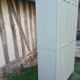 Parisian wardrobe with 2 doors and 3 shelves in Luxembourg green.