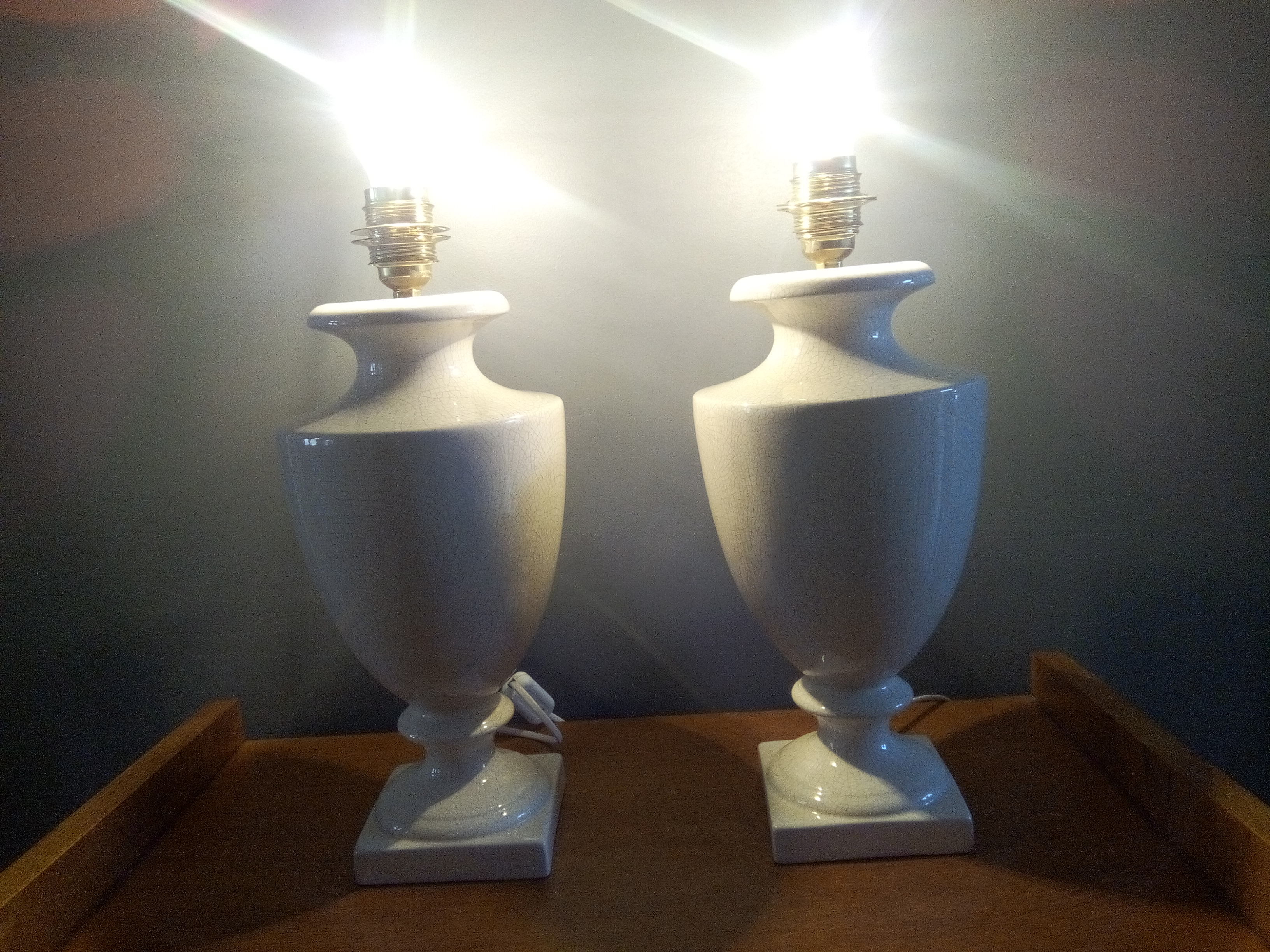 Pair of legs of cracked earthenware lamps
