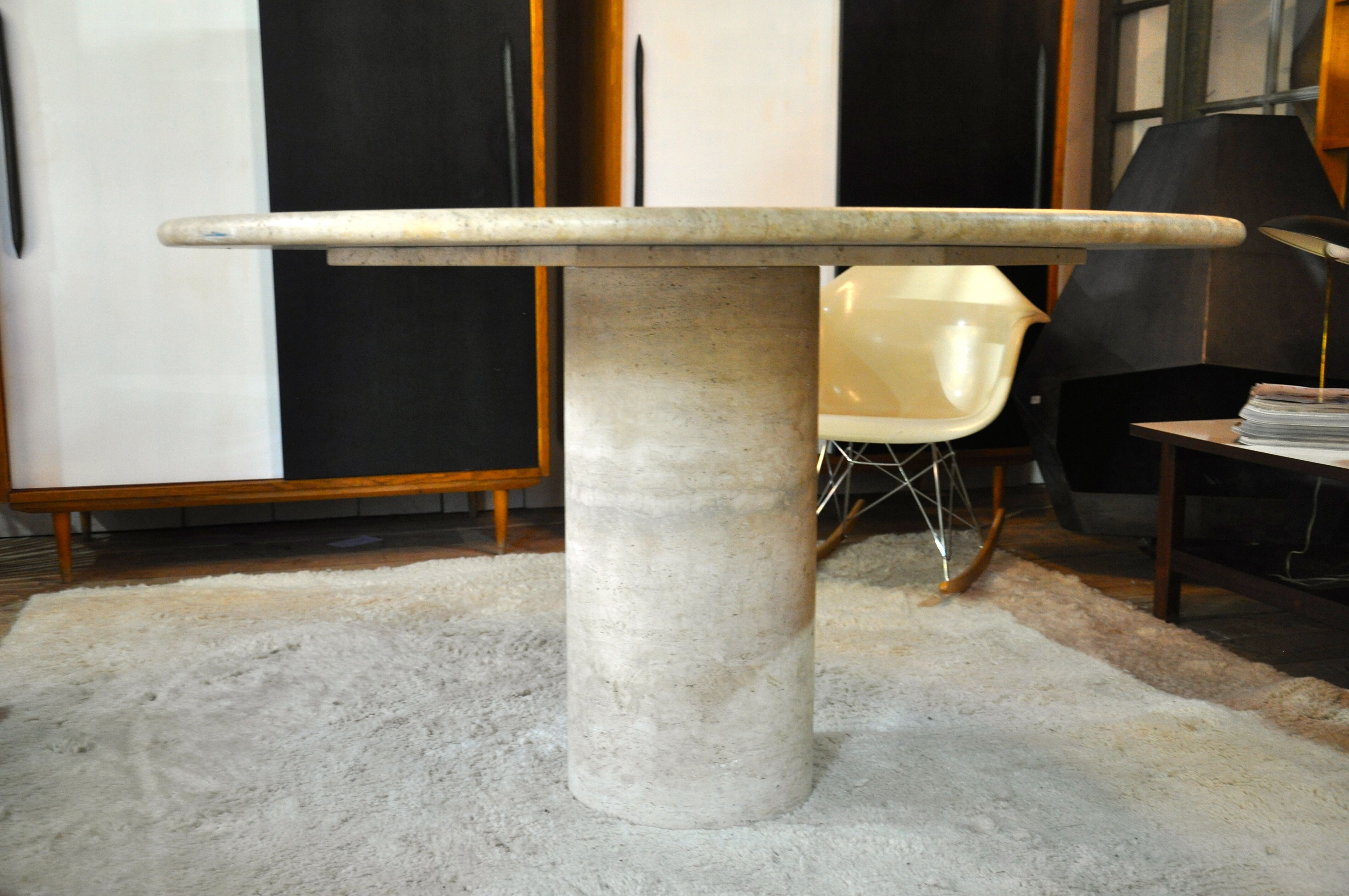 Round travertine table