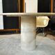 Round travertine table