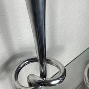 Pair of large aluminium bow candlesticks, Italy, 1970.