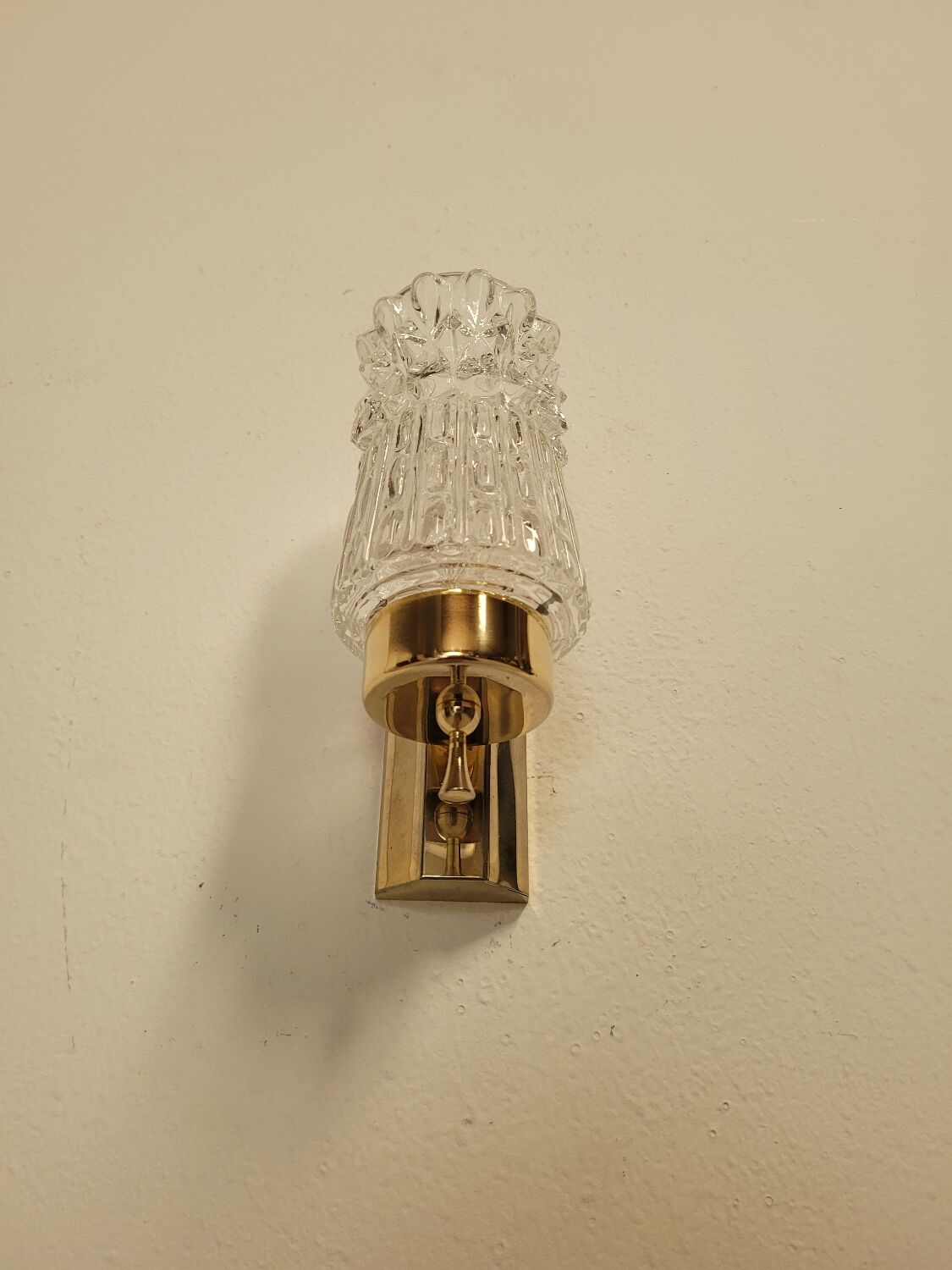 Pair of vintage brass and glass wall lights from the 1960s