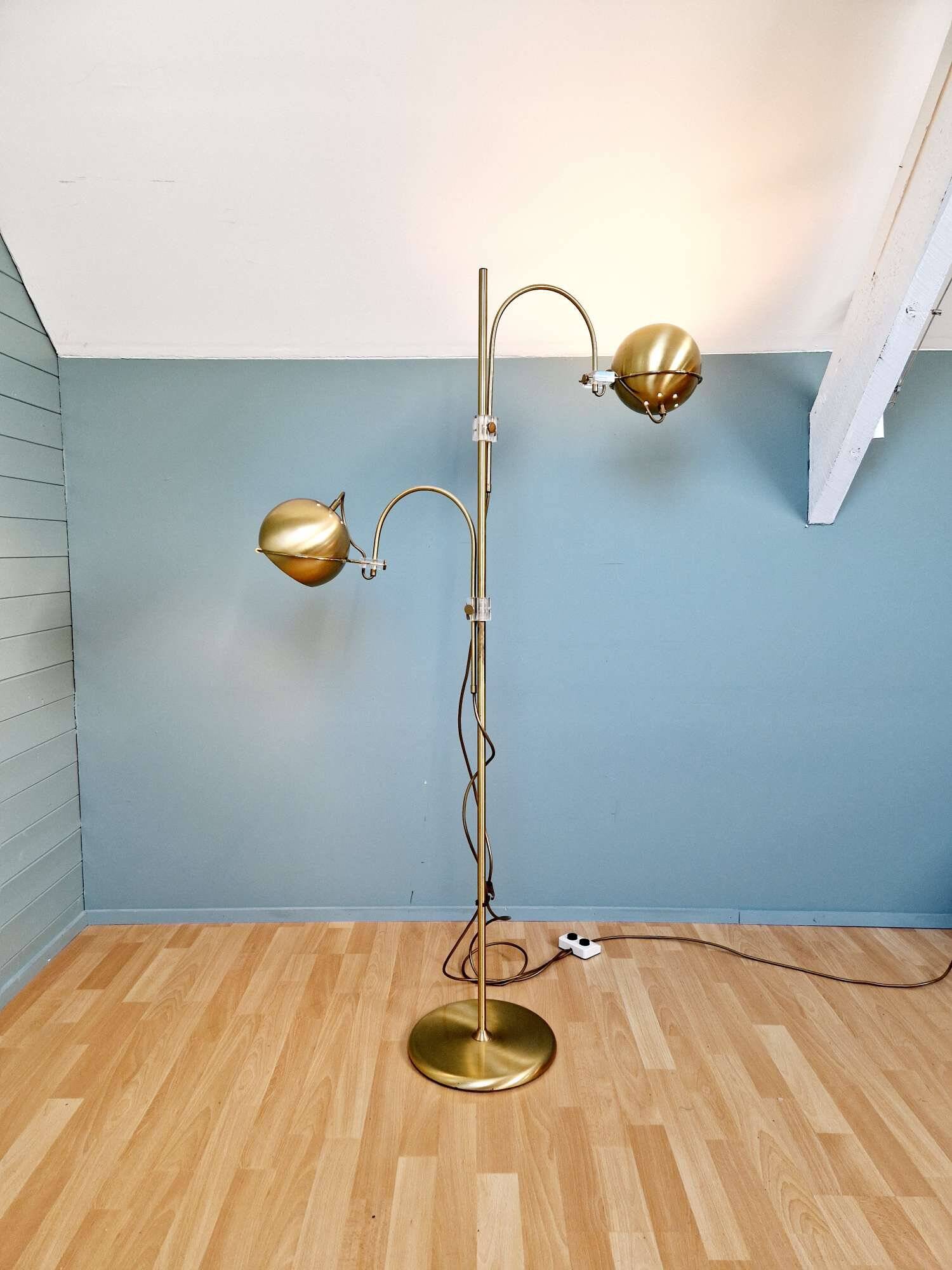 Brass eyeball floor lamp, by Gepo, 1960s-70s.