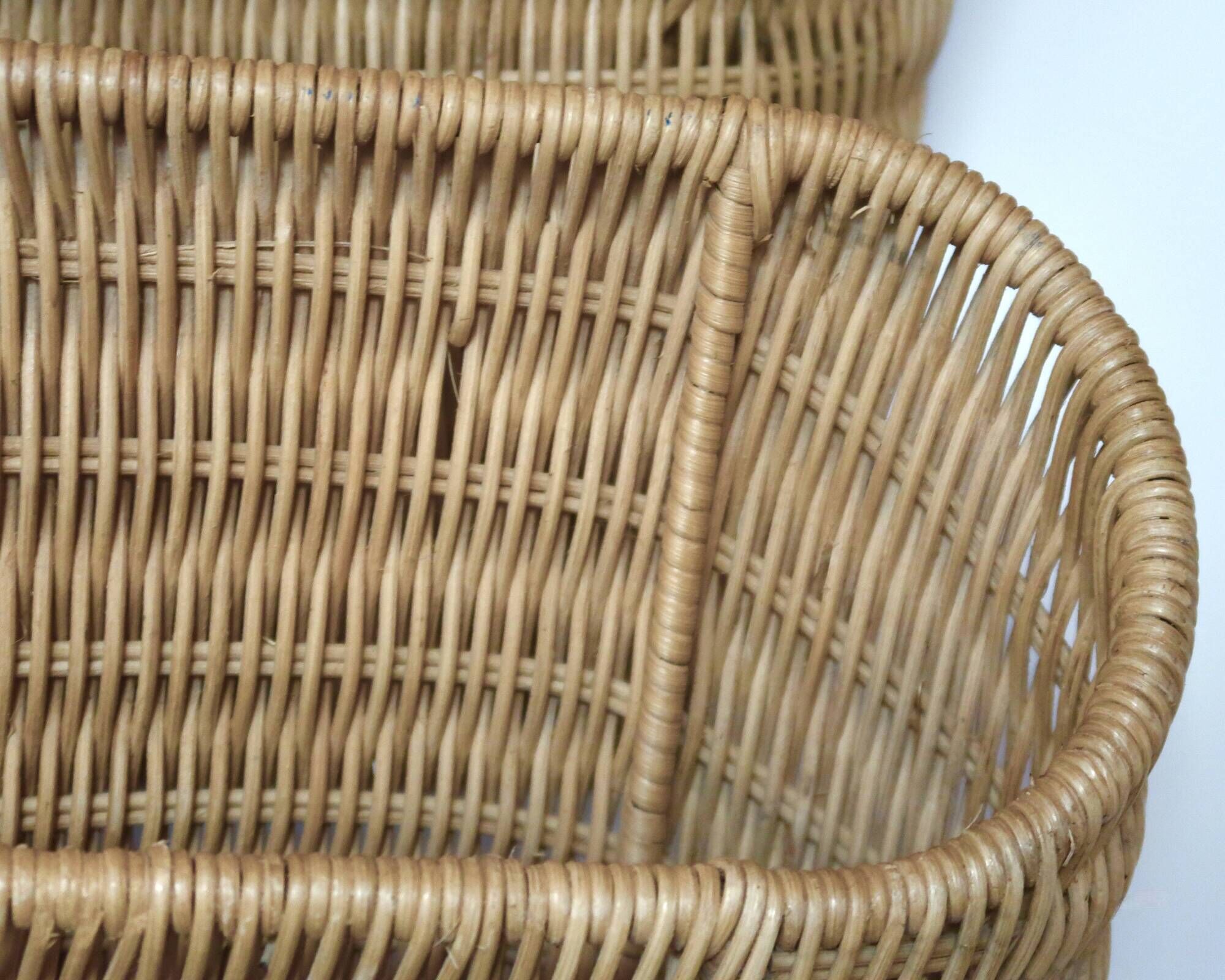 Wall-mounted magazine rack TIBY in rattan wicker by Karl Malmvall for Ikea from the 90s.