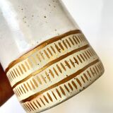Handmade golden ceramic mug
