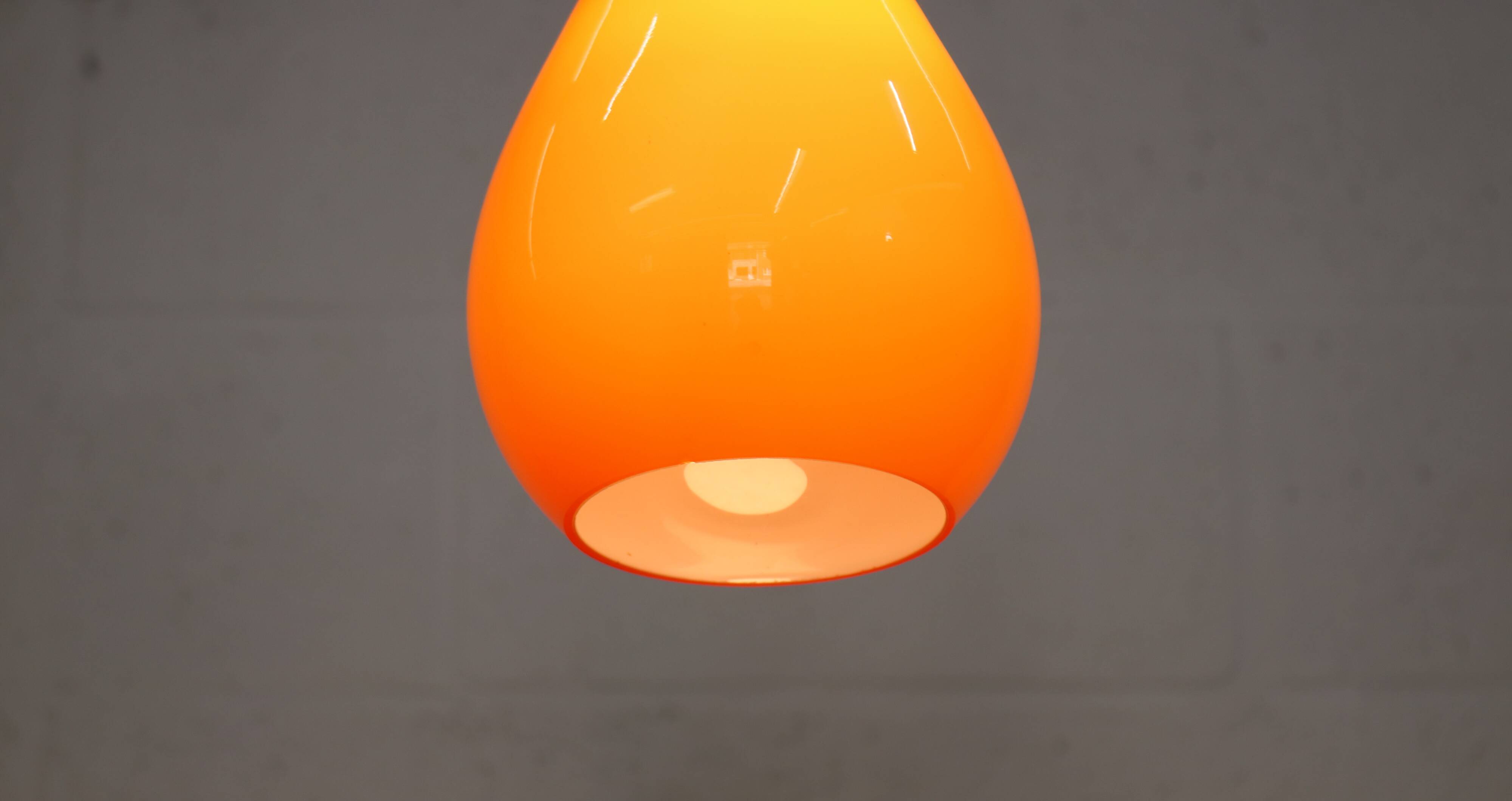 Orange teardrop glass pendant lamp made by Holmegaard - Denmark 1960