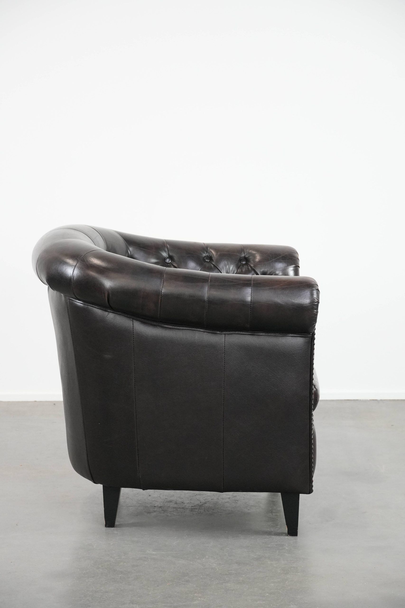 Dark luxury cowhide Chesterfield club armchair in English style