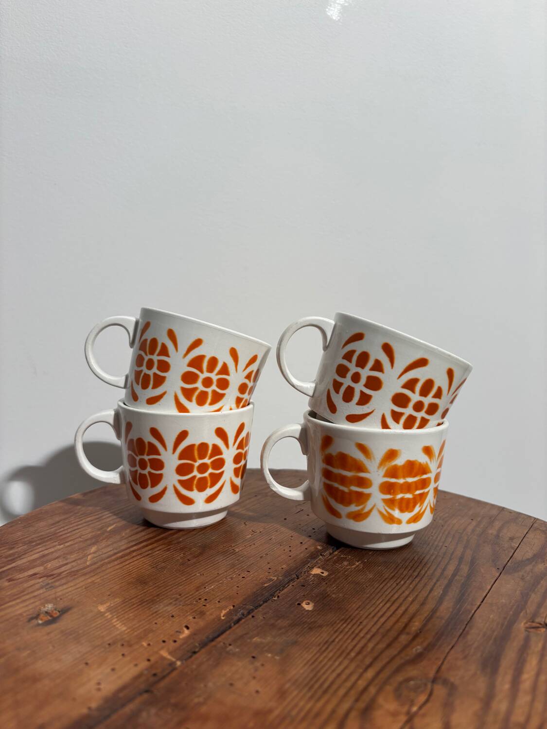 Vintage set of 4 Sarreguemines cups with orange decor