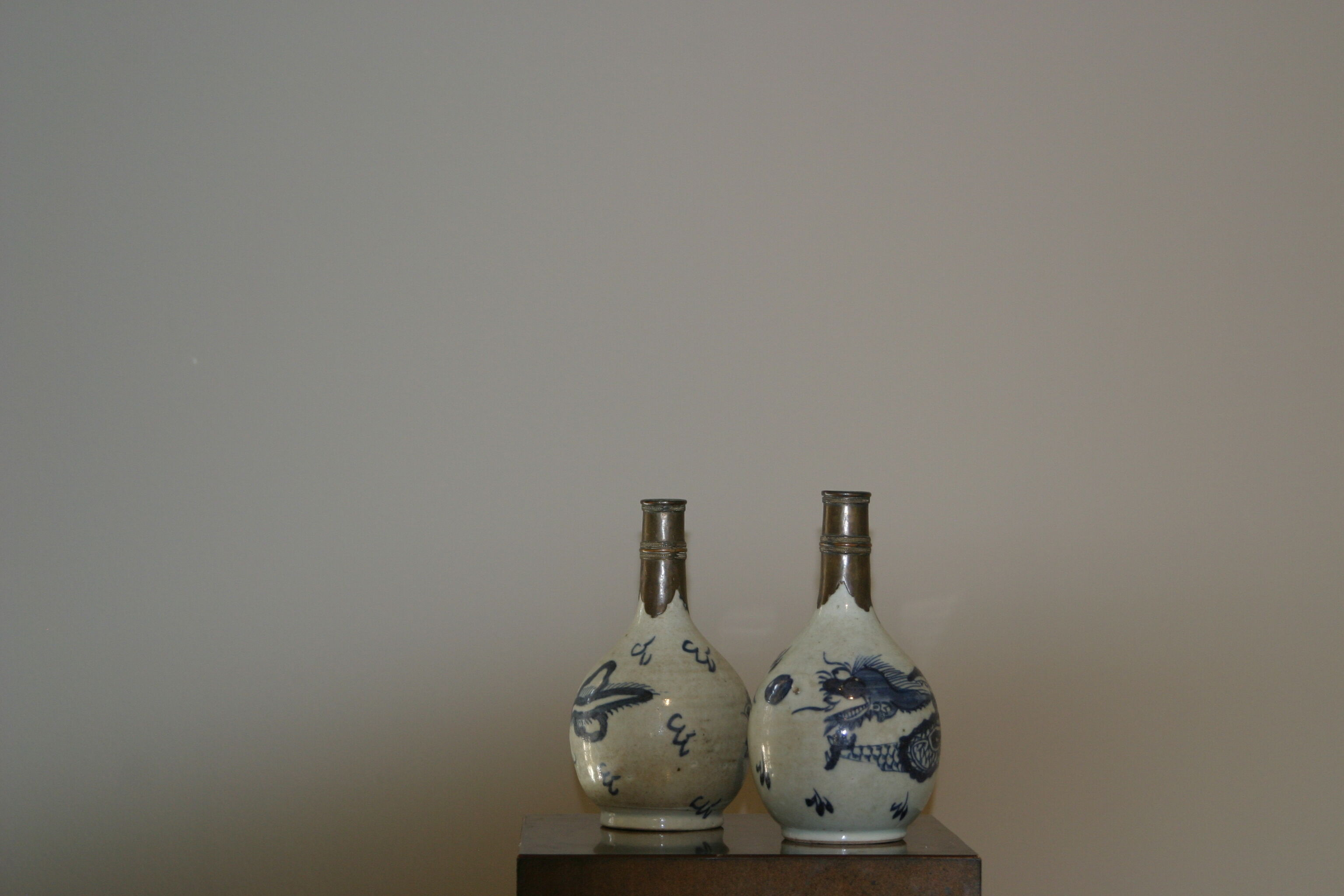 Two chinese porcelain and silver gourds