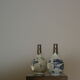 Two chinese porcelain and silver gourds