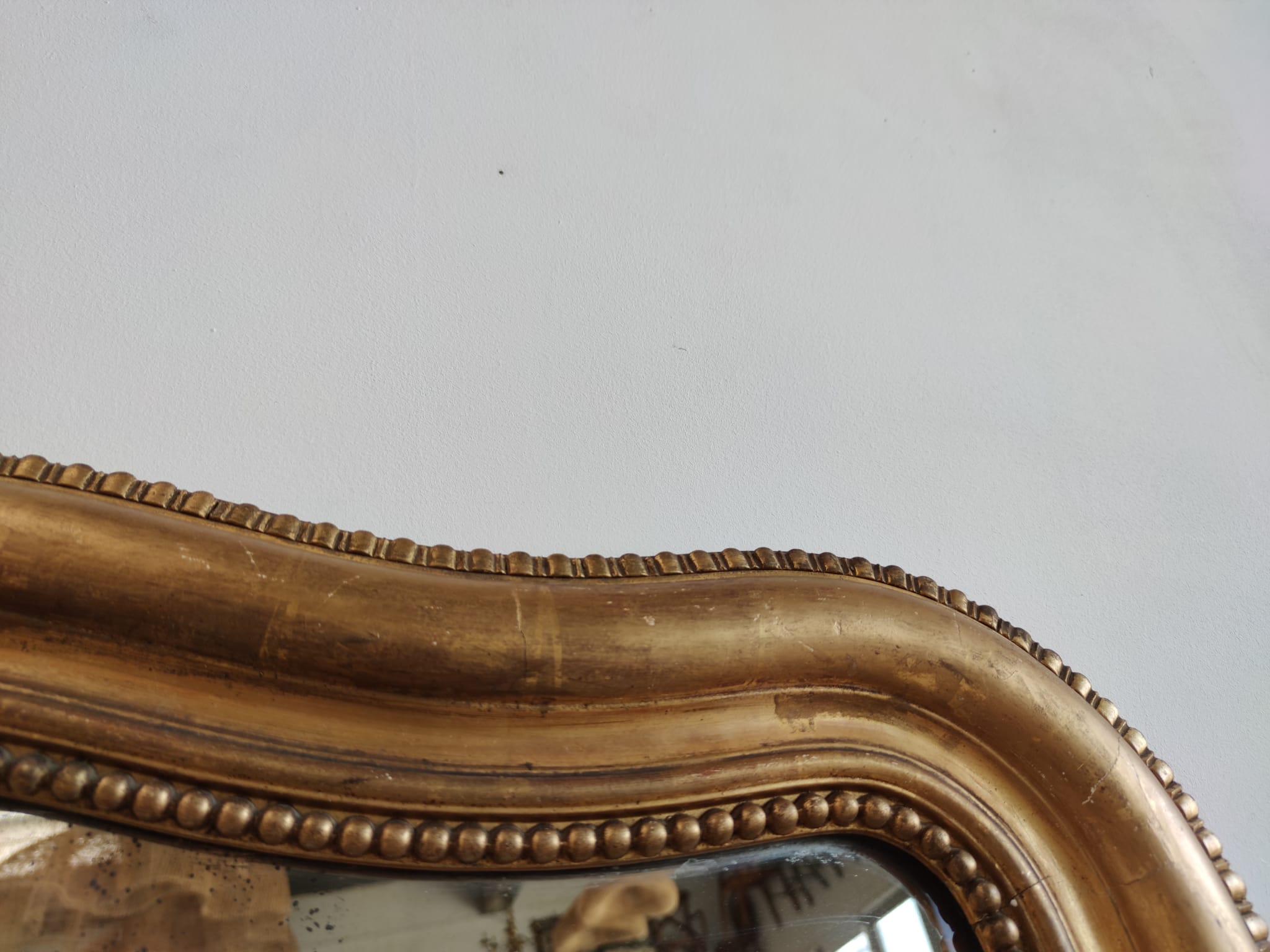 Louis Philippe gilded mirror with gendarme hat nineteenth H:130cm