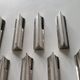 Eight Boulenger knife holders in art deco silver metal