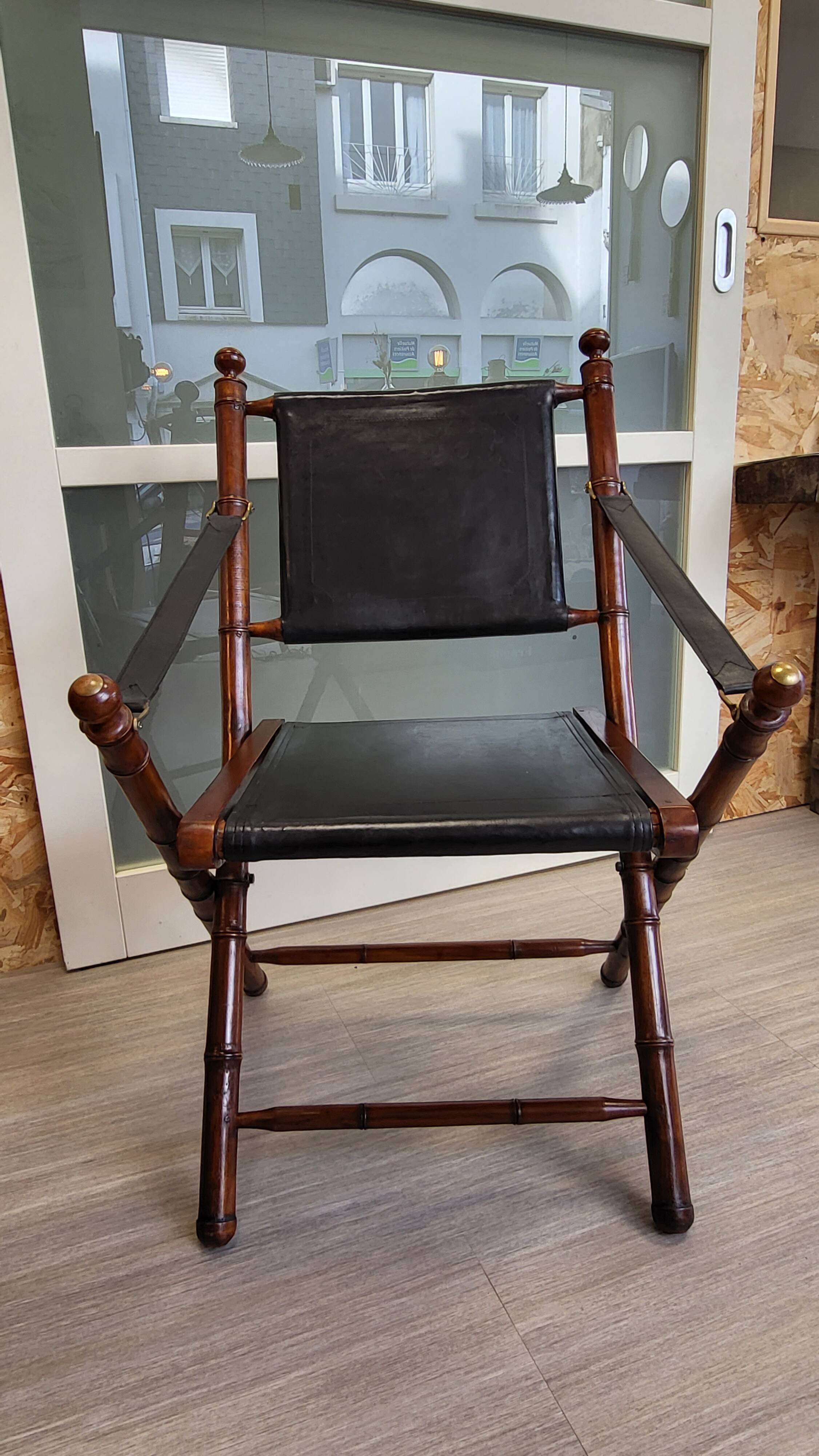 Colonial style folding leather and teak armchair