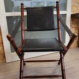 Colonial style folding leather and teak armchair