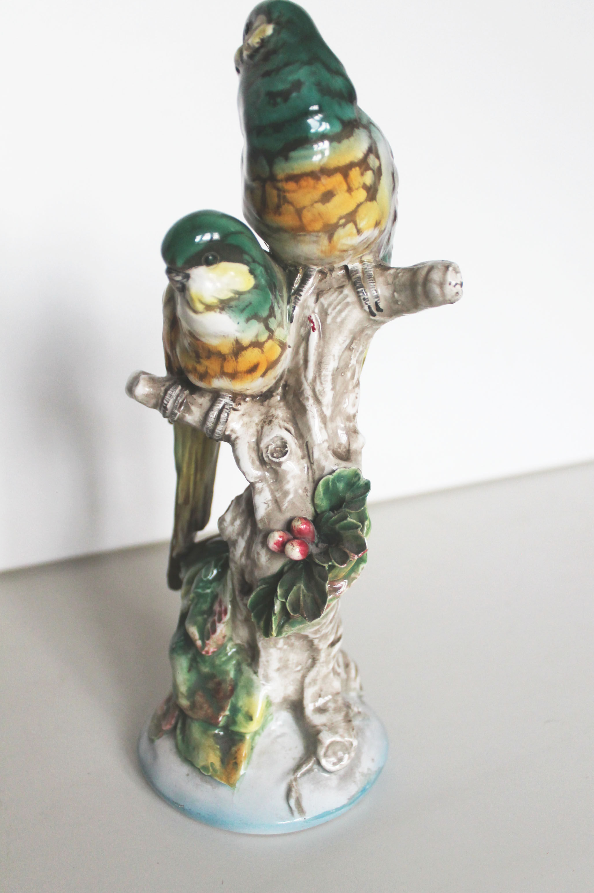 Couple of ceramic parakeets