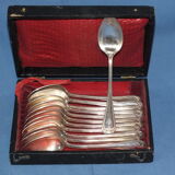 Old box of 12 small white metal spoons