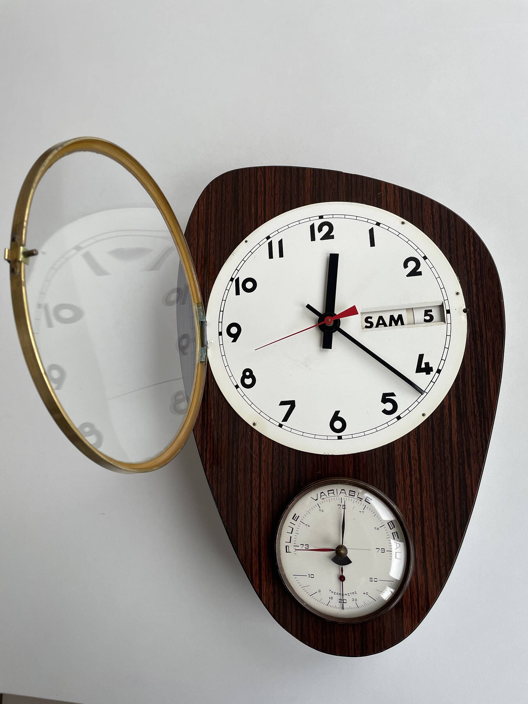 Vintage 1960s wall clock with thermometer and date