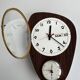 Vintage 1960s wall clock with thermometer and date