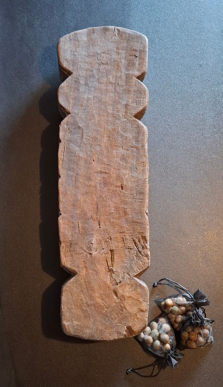 Genuine traditional Awalé made of carved solid wood.