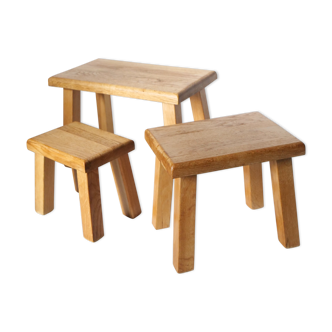 compact trundle tables in brutalist light oak