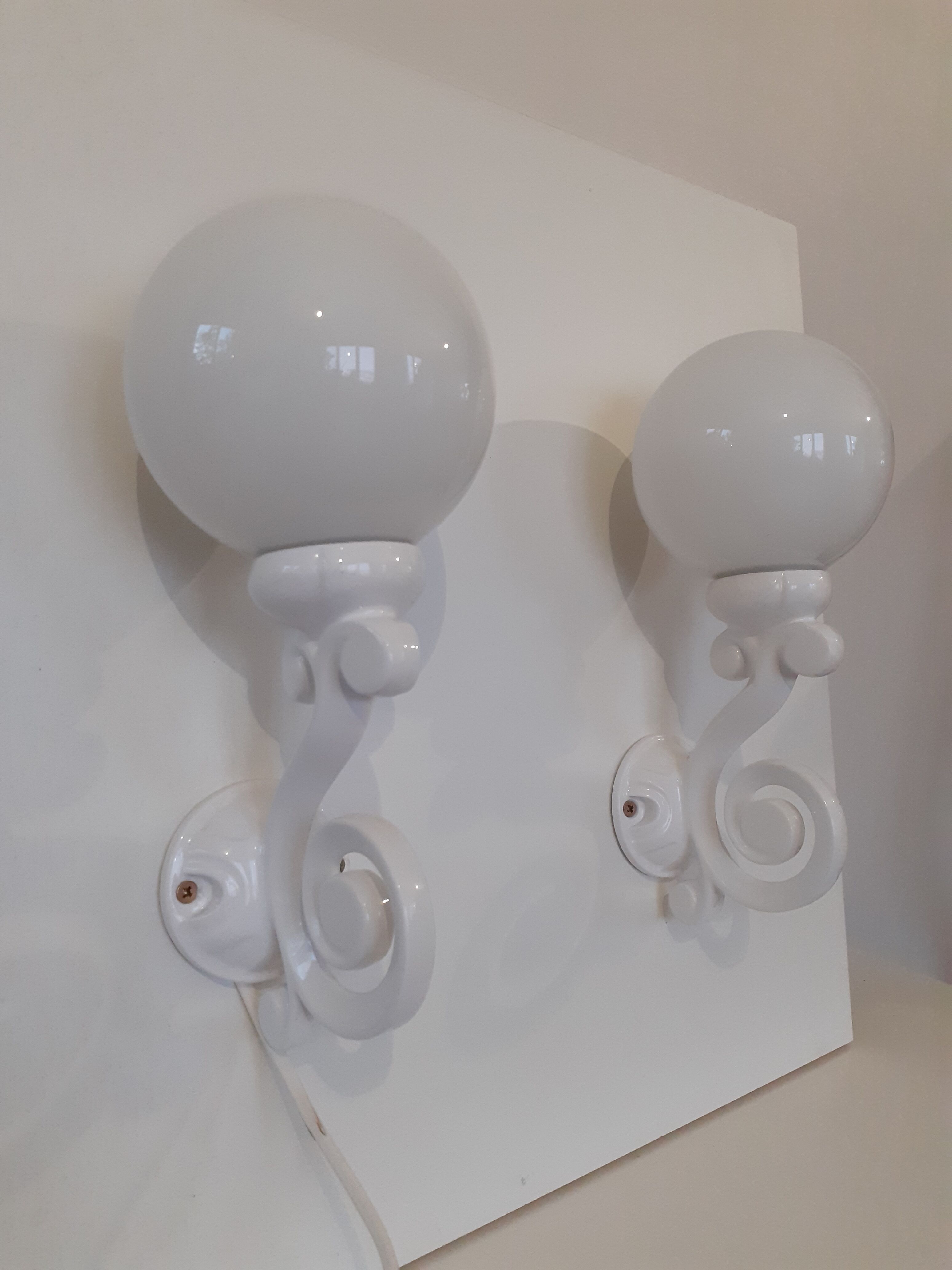 Pair of cast iron sconces