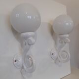 Pair of cast iron sconces