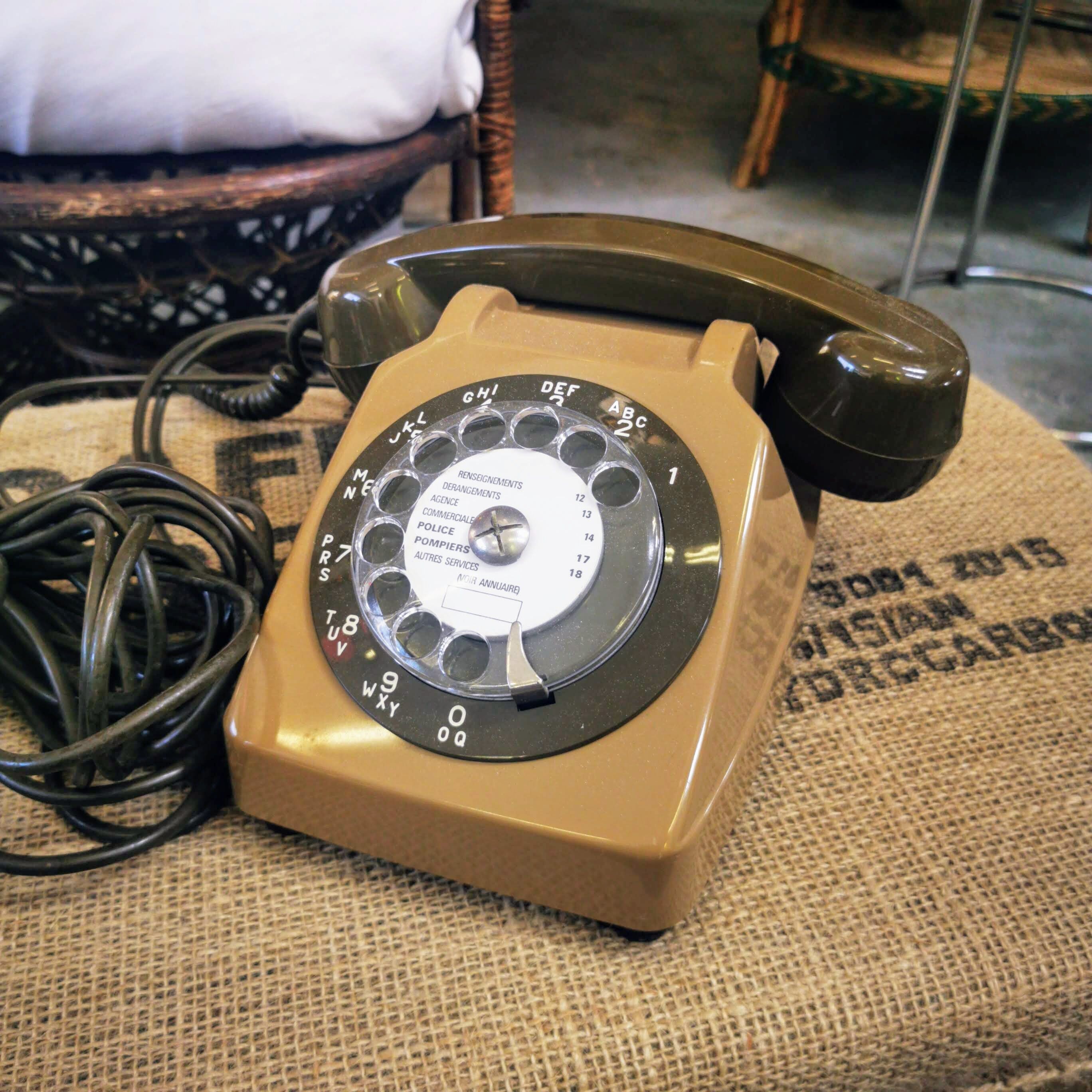 Brown dial phone