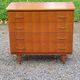 Chest of drawers from the 50s-60s in golden mahogany 4 drawers feet bobbin