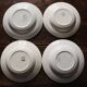 A set of 4 mismatched Art Deco red blue soup plates