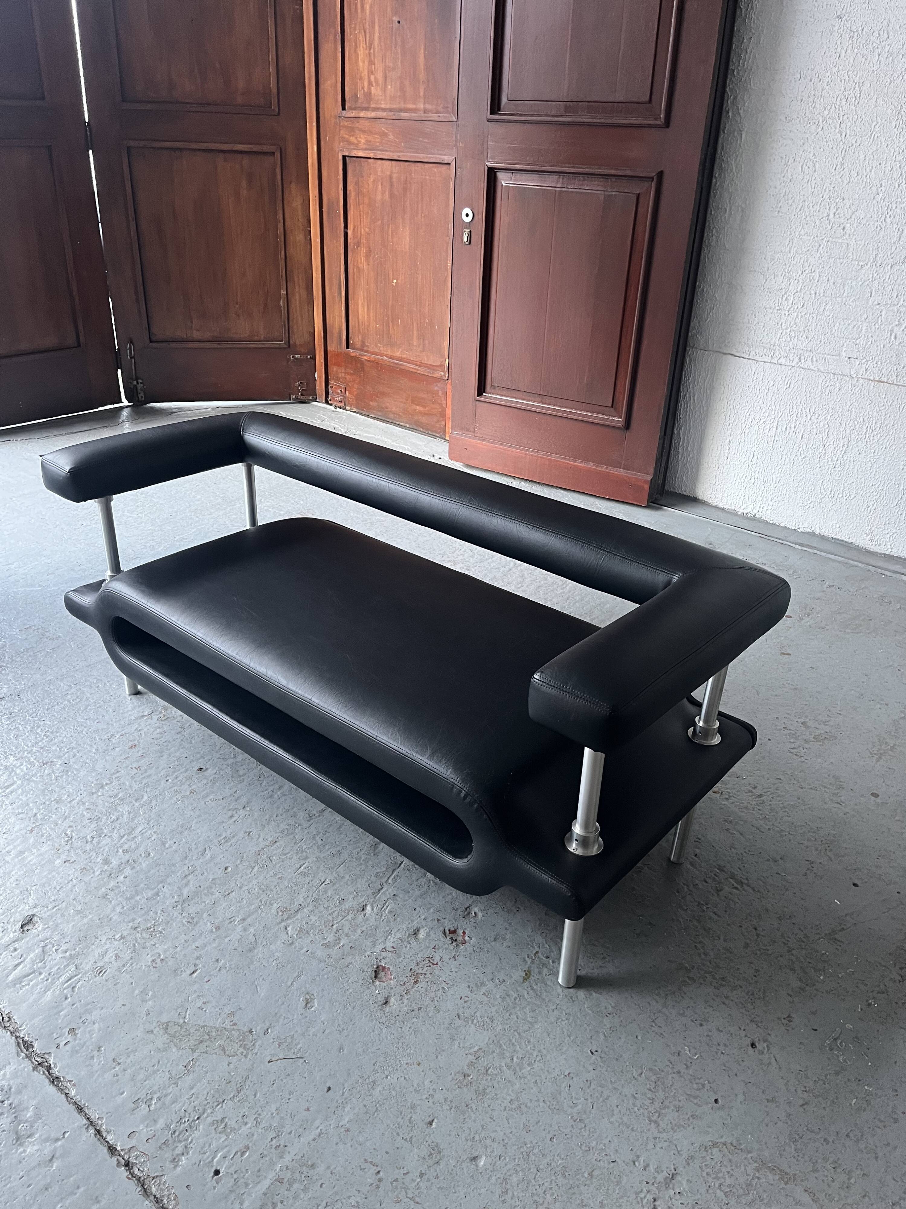 ‘Magazine’ easy chair and 2-seater by Michael Young