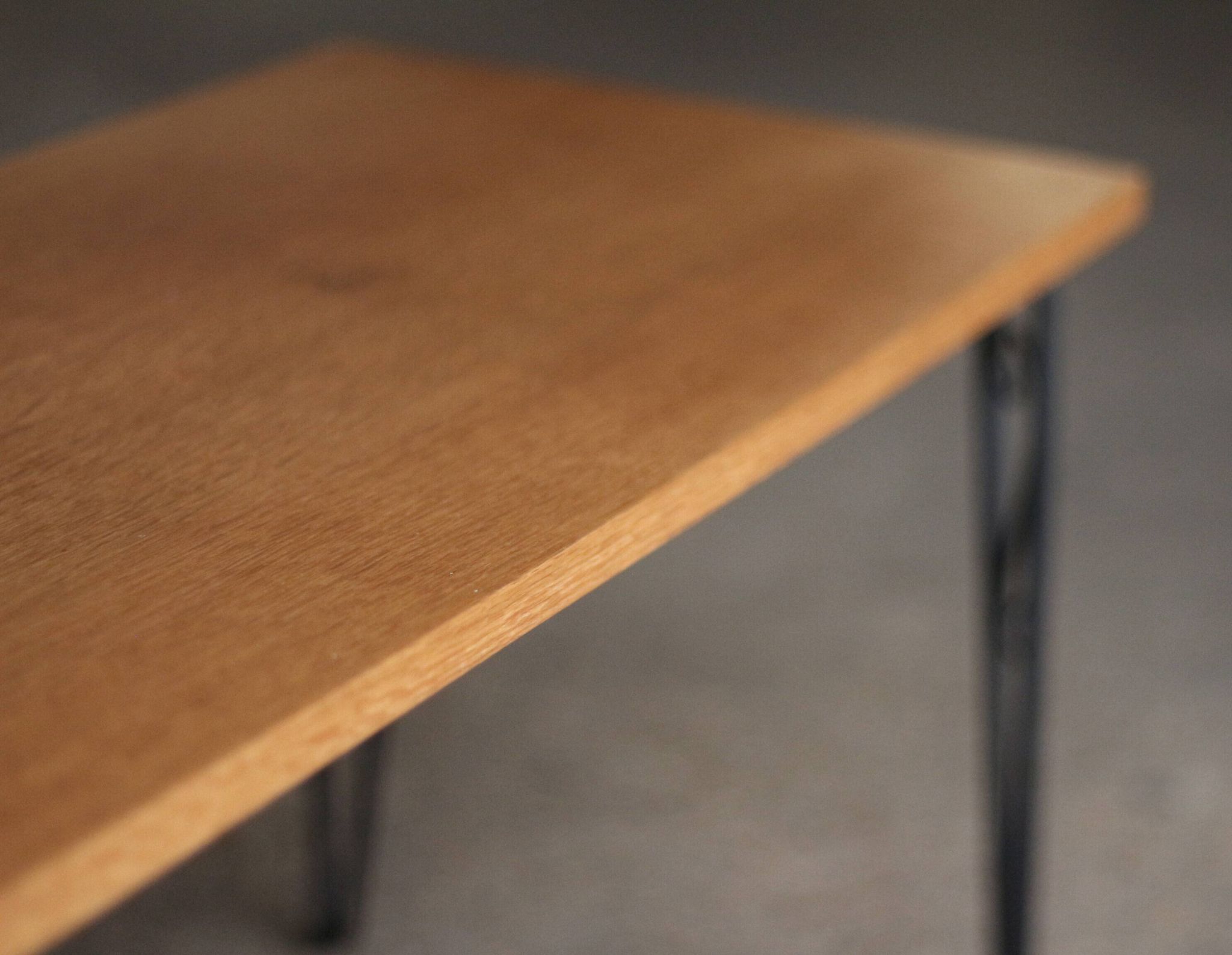Nice vintage coffee table (1970s). Made of plywood and cast iron.