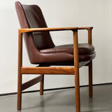 Fauteuil en cuir et bois de Ib Kofod Larsen