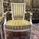 Pair of Louis XVI style cabriolet armchairs and Louis XVI chair