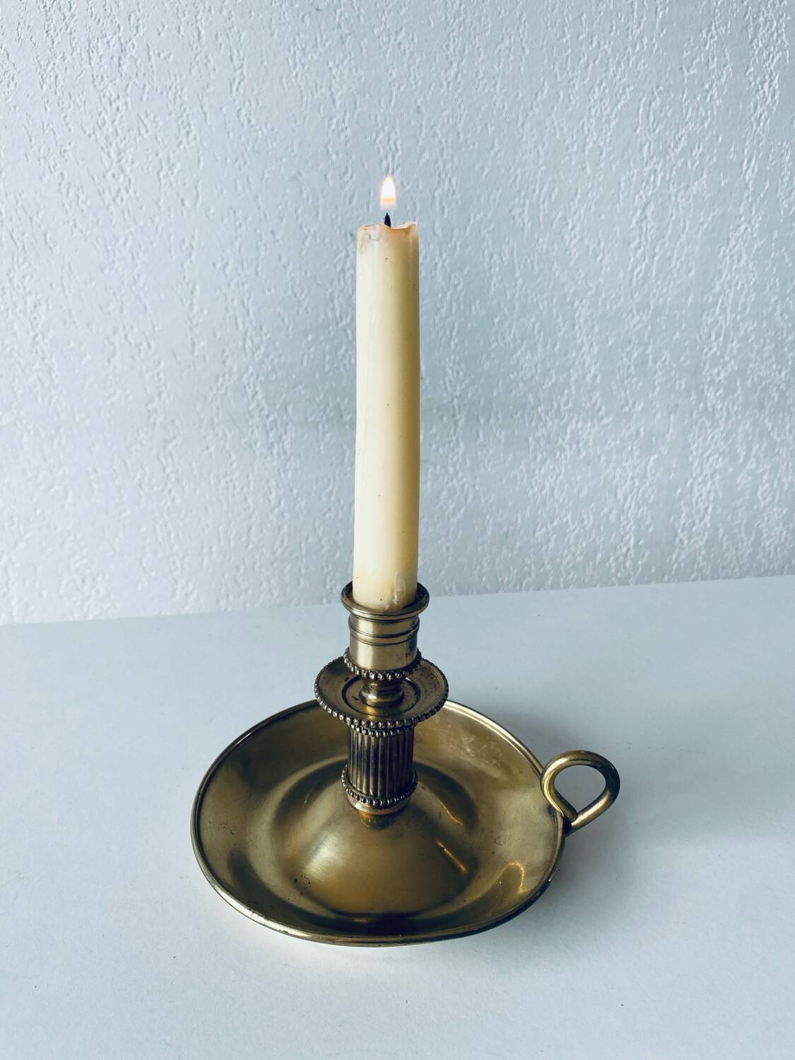 Candle holder with brass handle