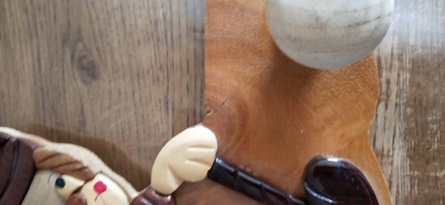 Wooden clown coat rack