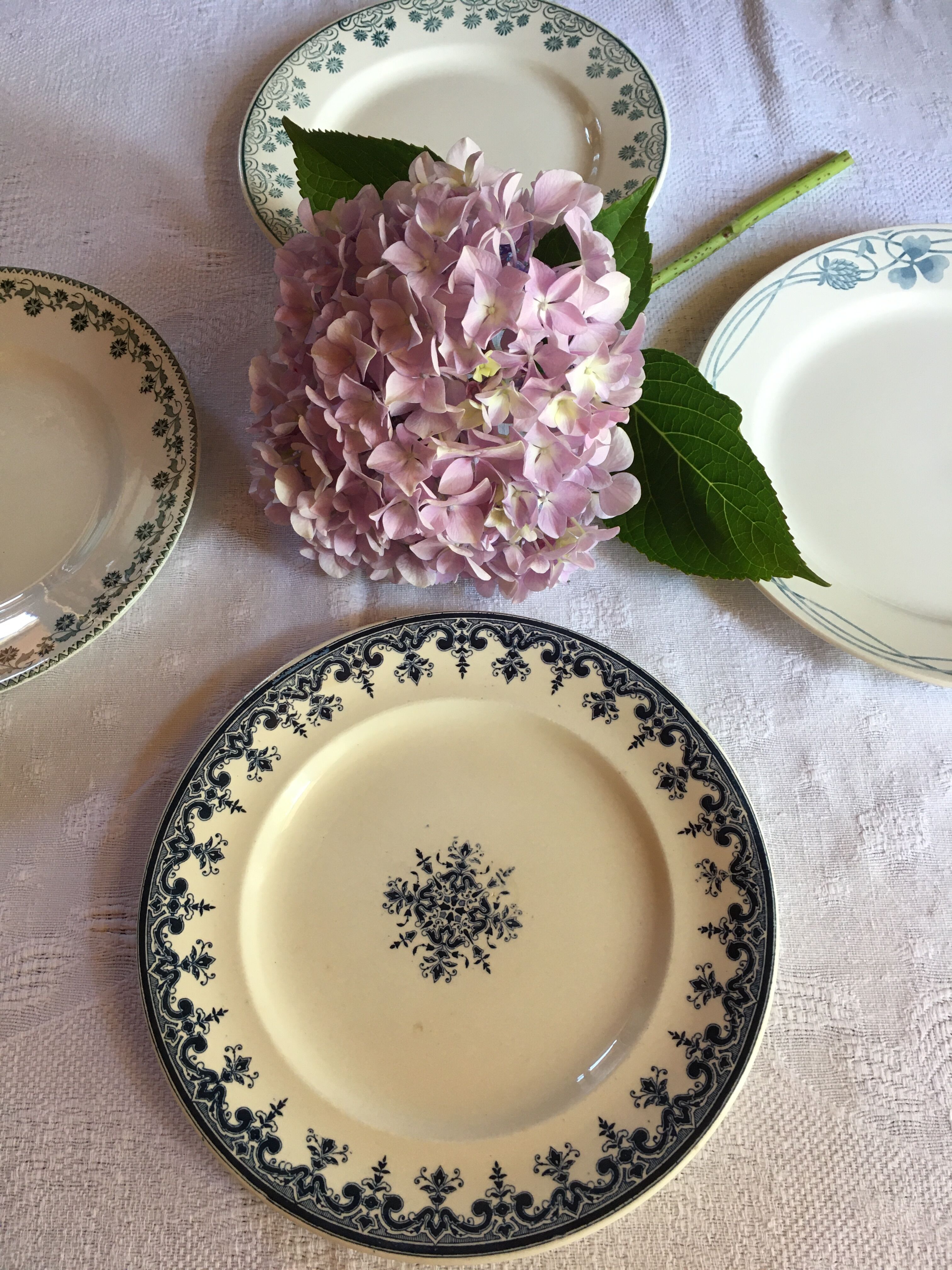 Set of 4 old plates with blue-green décor