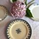 Set of 4 old plates with blue-green décor
