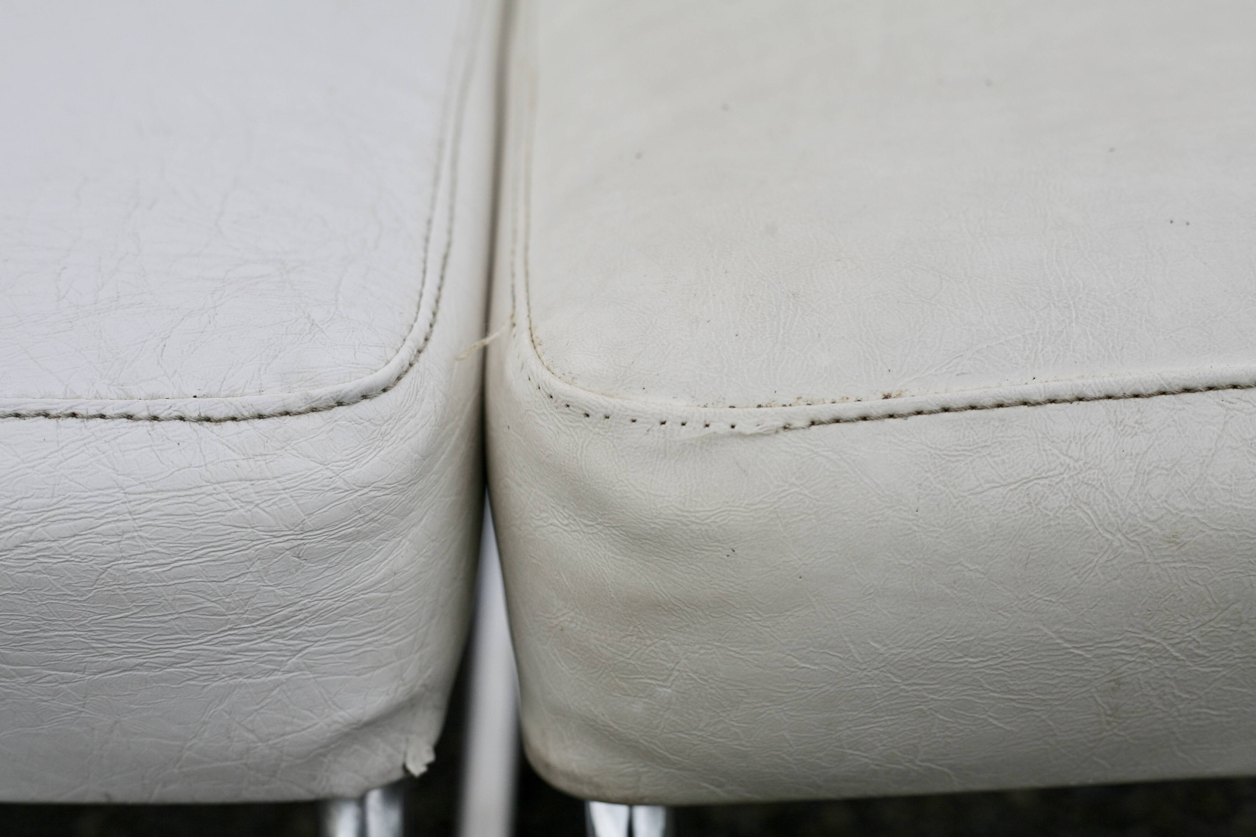 4 armchairs forming a modular sofa. Steel, imitation leather, 70s